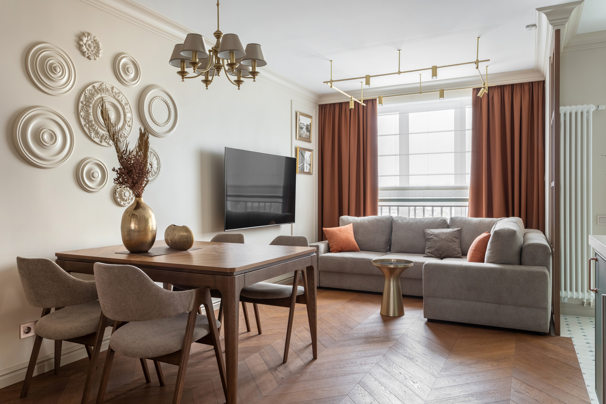 Minimalist living room with cream sofa and paper lantern
